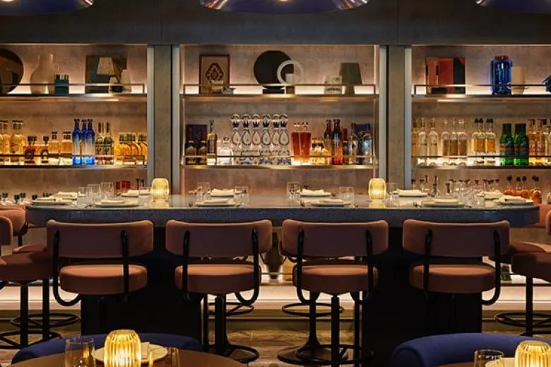 Virgin Voyages cruise deal featuring a sleek, adults-only ship offering stylish design, upscale dining, and immersive itineraries across stunning destinations