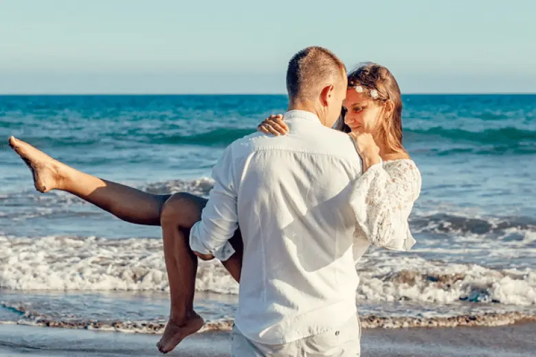 Honeymoon cruise deal featuring a romantic ship journey with sunset views, luxury suites, and serene ocean backdrops perfect for couples