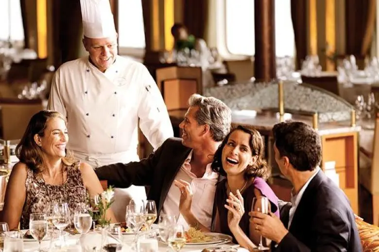 Luxury cruise deal showcasing an upscale ship with elegant suites, fine dining, and exclusive experiences sailing through pristine waters
